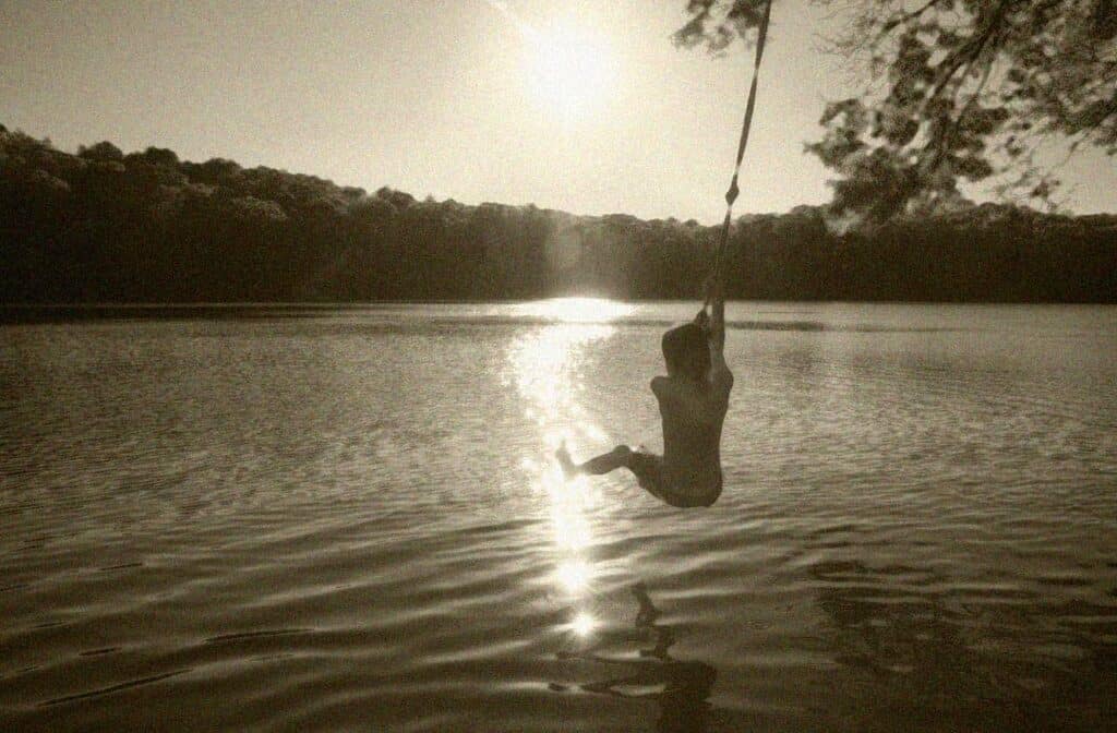 Those hot summer days swinging over the river